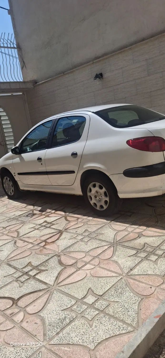 پژو ۲۰۶ صندوق دار v8 - 1391