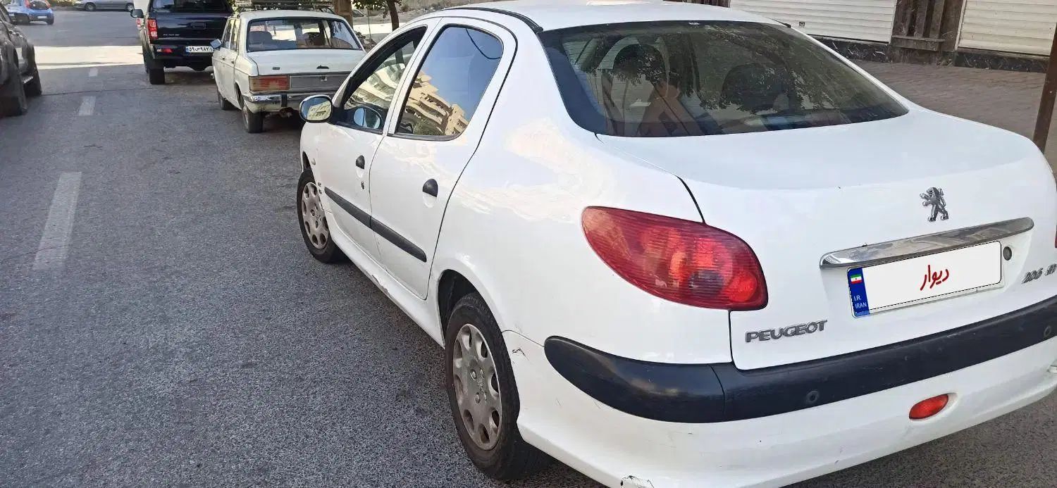 پژو ۲۰۶ صندوق دار v8 - 1396
