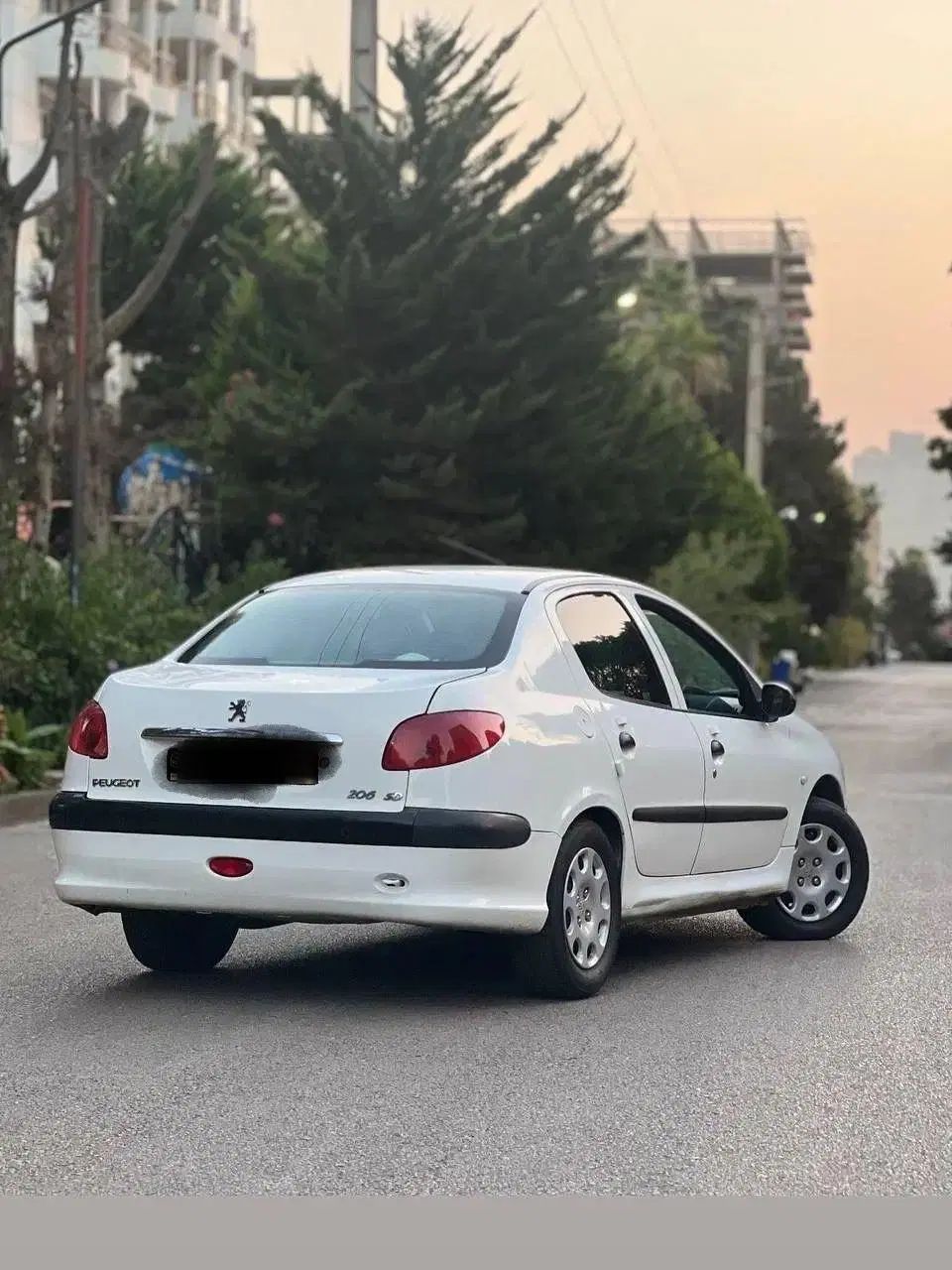 پژو ۲۰۶ صندوق دار v8 - 1396