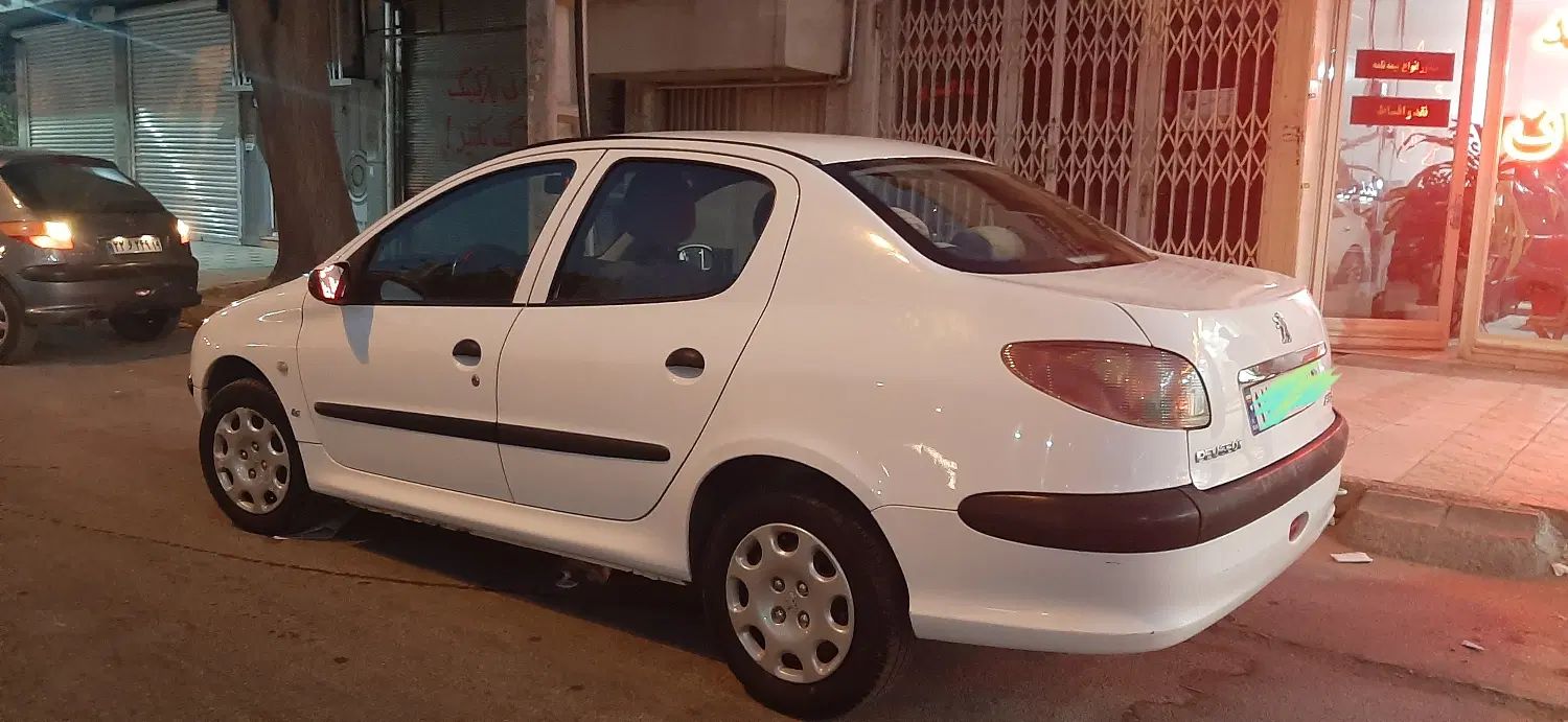 پژو ۲۰۶ صندوق دار v8 - 1391