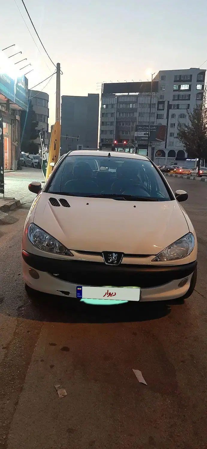 پژو ۲۰۶ صندوق دار v8 - 1391