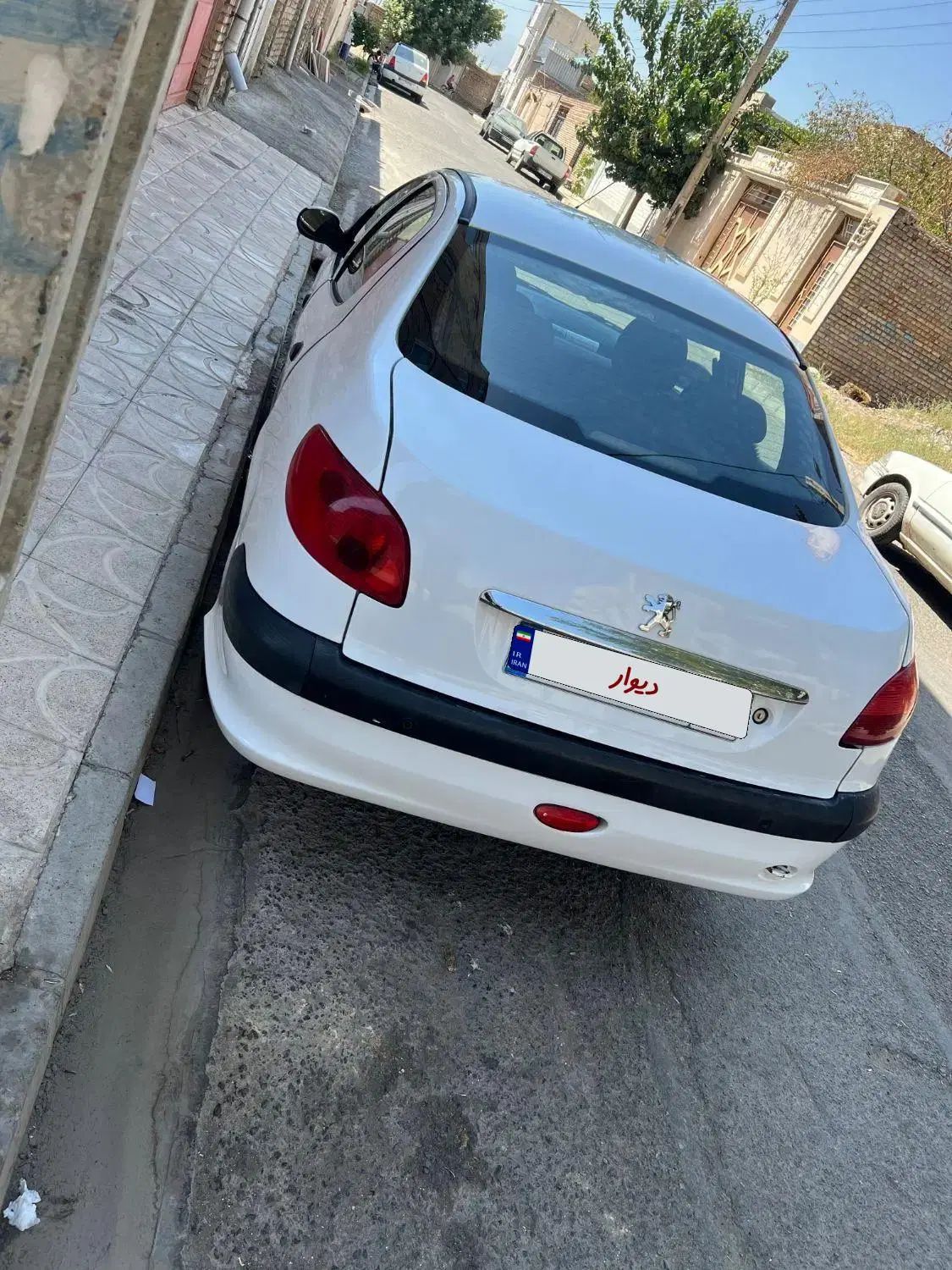 پژو ۲۰۶ صندوق دار v8 - 1396