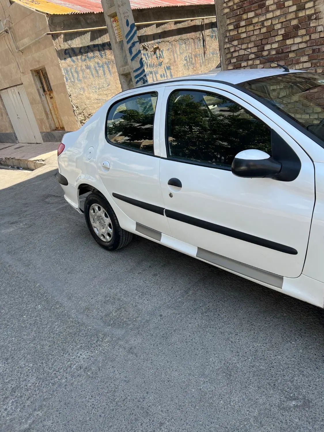پژو ۲۰۶ صندوق دار v8 - 1396