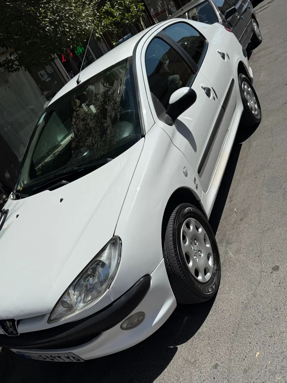 پژو ۲۰۶ صندوق دار v8 - 1390