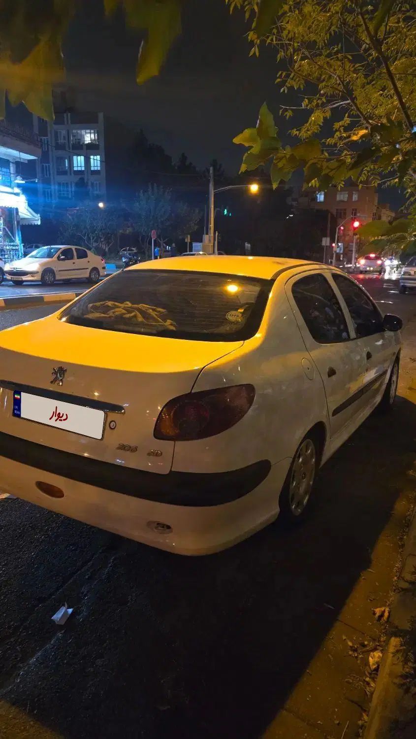 پژو ۲۰۶ صندوق دار v8 - 1394