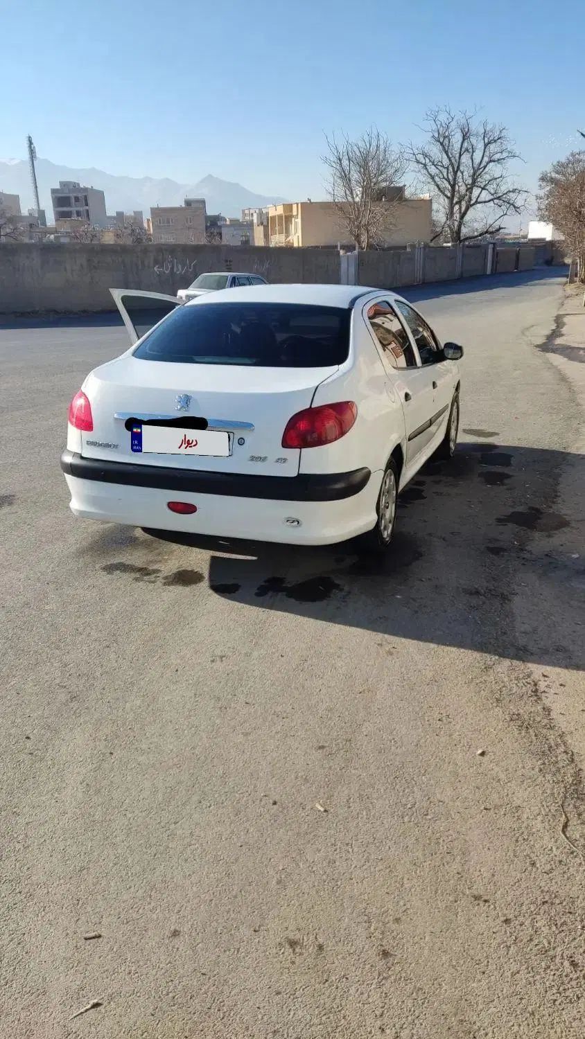 پژو ۲۰۶ صندوق دار v8 - 1398