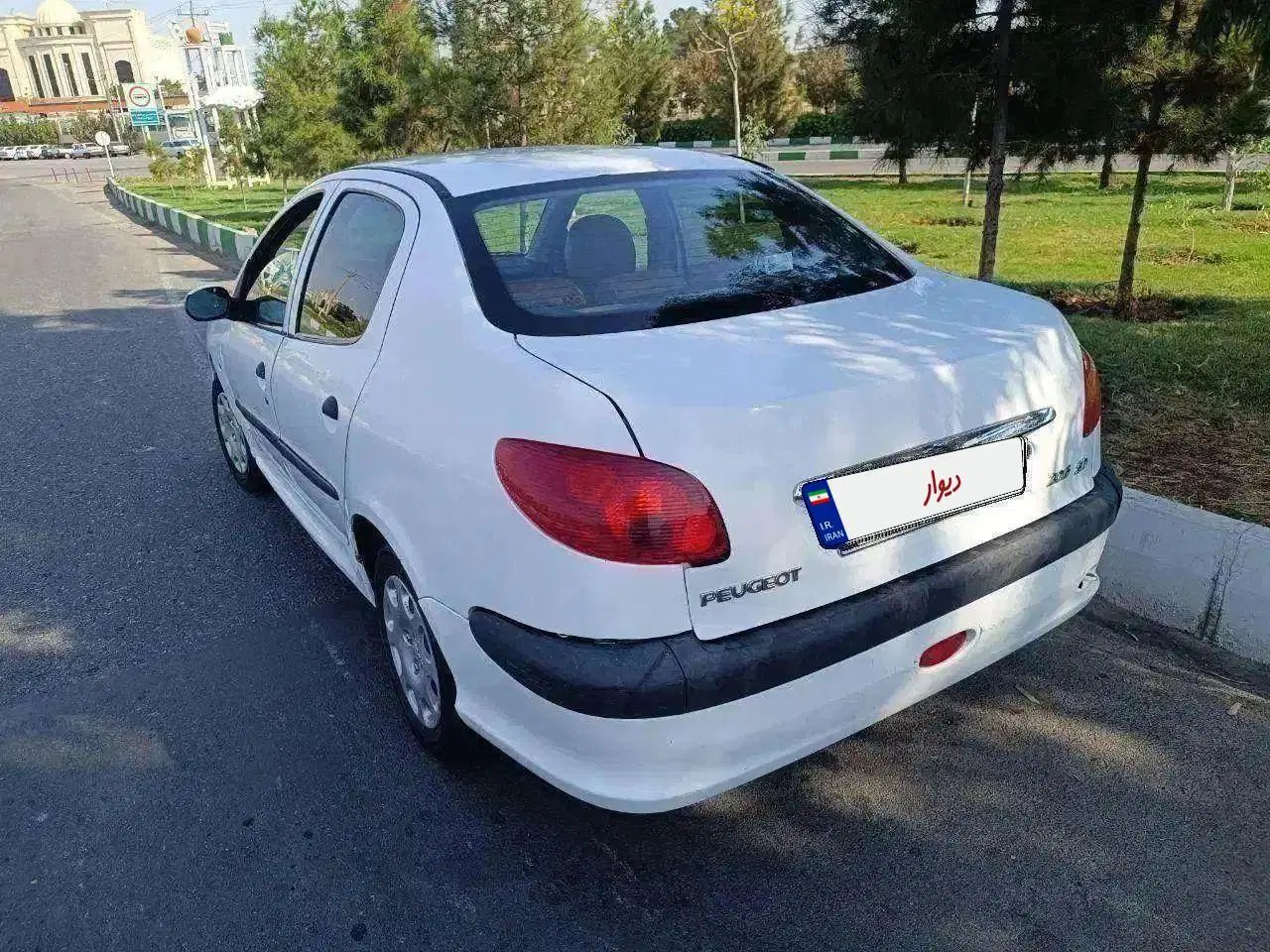 پژو ۲۰۶ صندوق دار v8 - 1391