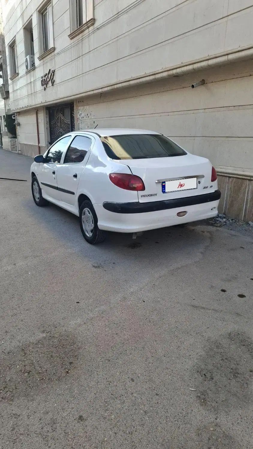 پژو ۲۰۶ صندوق دار v8 - 1397