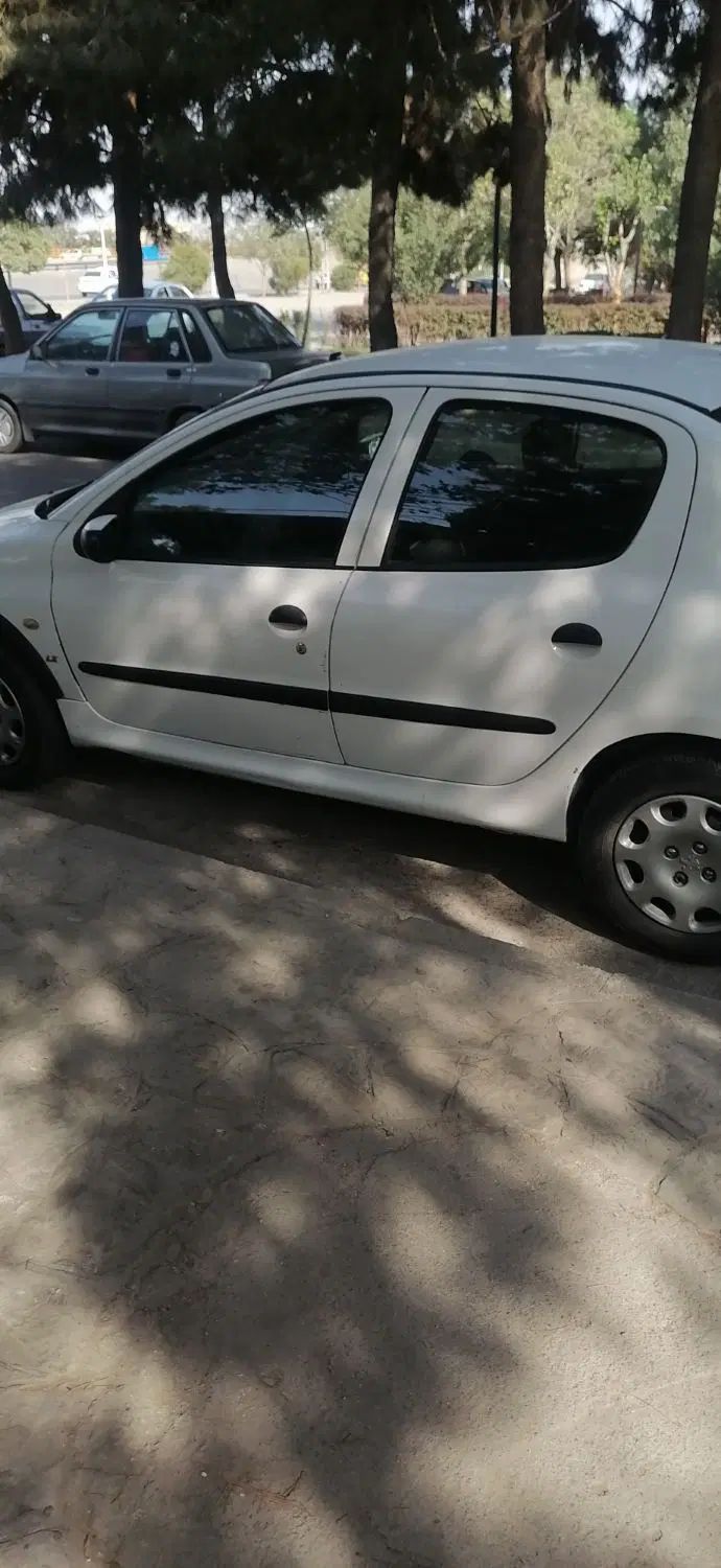 پژو ۲۰۶ صندوق دار v8 - 1391