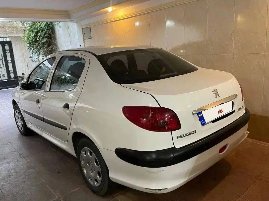 پژو ۲۰۶ صندوق دار v8 - 1391