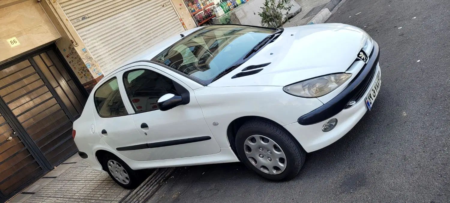 پژو ۲۰۶ صندوق دار v8 - 1396
