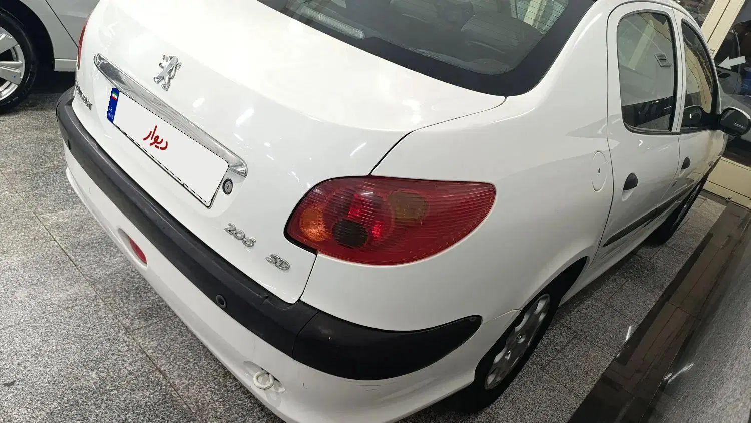 پژو ۲۰۶ صندوق دار v8 - 1396