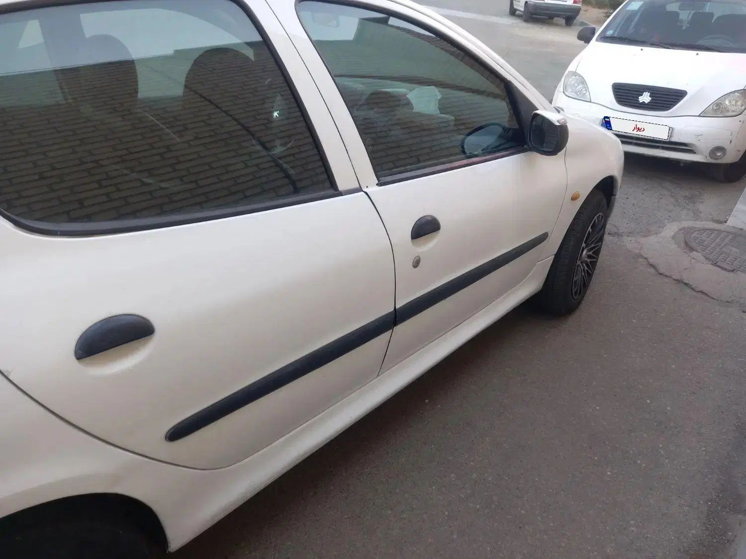 پژو ۲۰۶ صندوق دار v8 - 1395