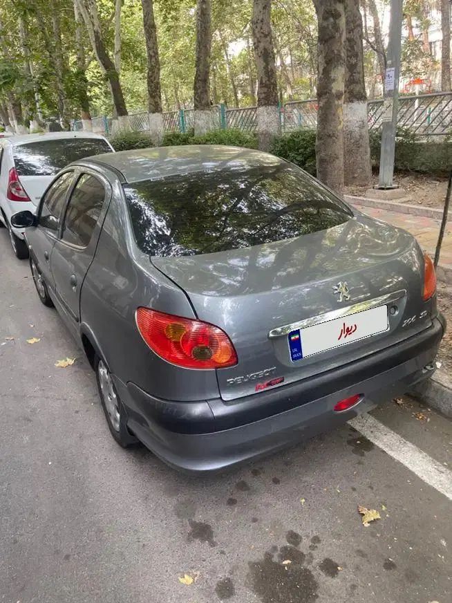 پژو ۲۰۶ صندوق دار v8 - 1394
