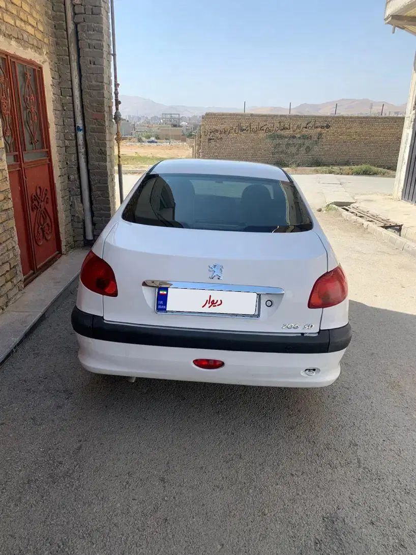 پژو ۲۰۶ صندوق دار v8 - 1394