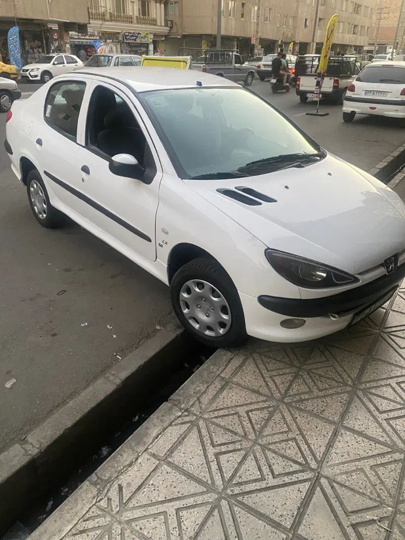 پژو ۲۰۶ صندوق دار v8 - 1391