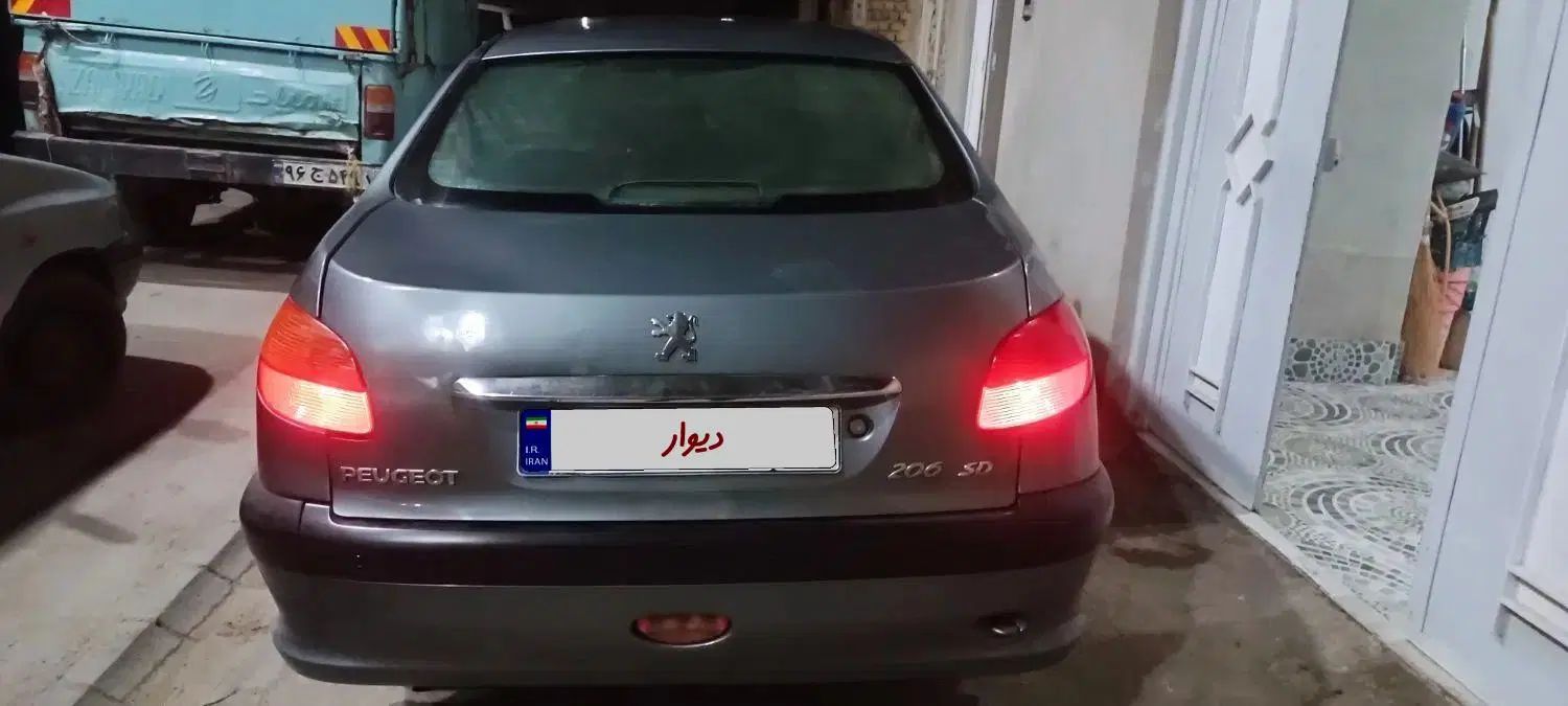 پژو ۲۰۶ صندوق دار v8 - 1391
