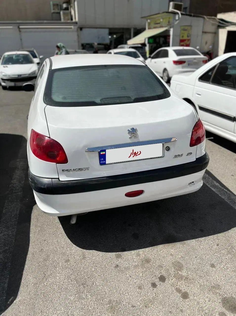 پژو ۲۰۶ صندوق دار v8 - 1397