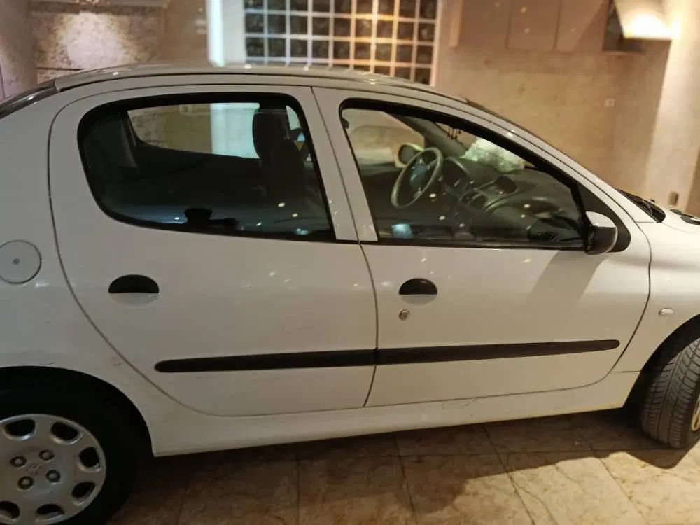پژو ۲۰۶ صندوق دار v8 - 1397