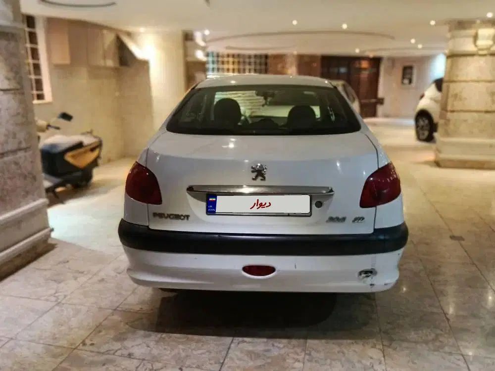 پژو ۲۰۶ صندوق دار v8 - 1397