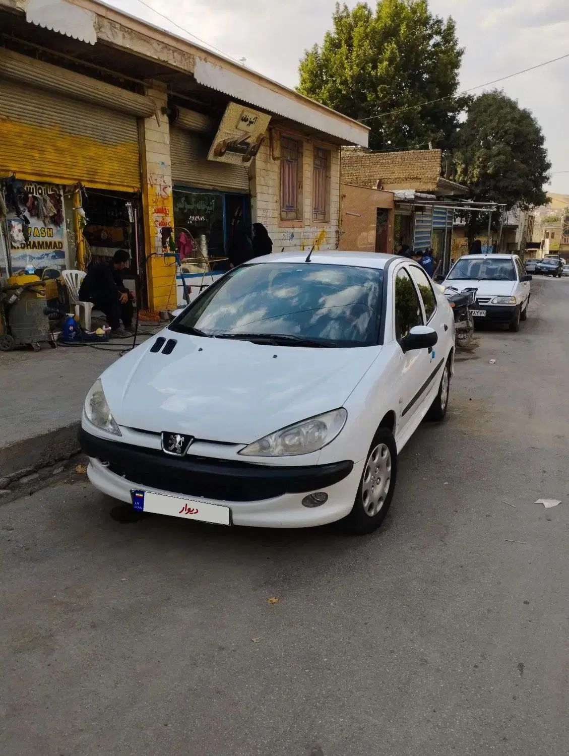 پژو ۲۰۶ صندوق دار v8 - 1395