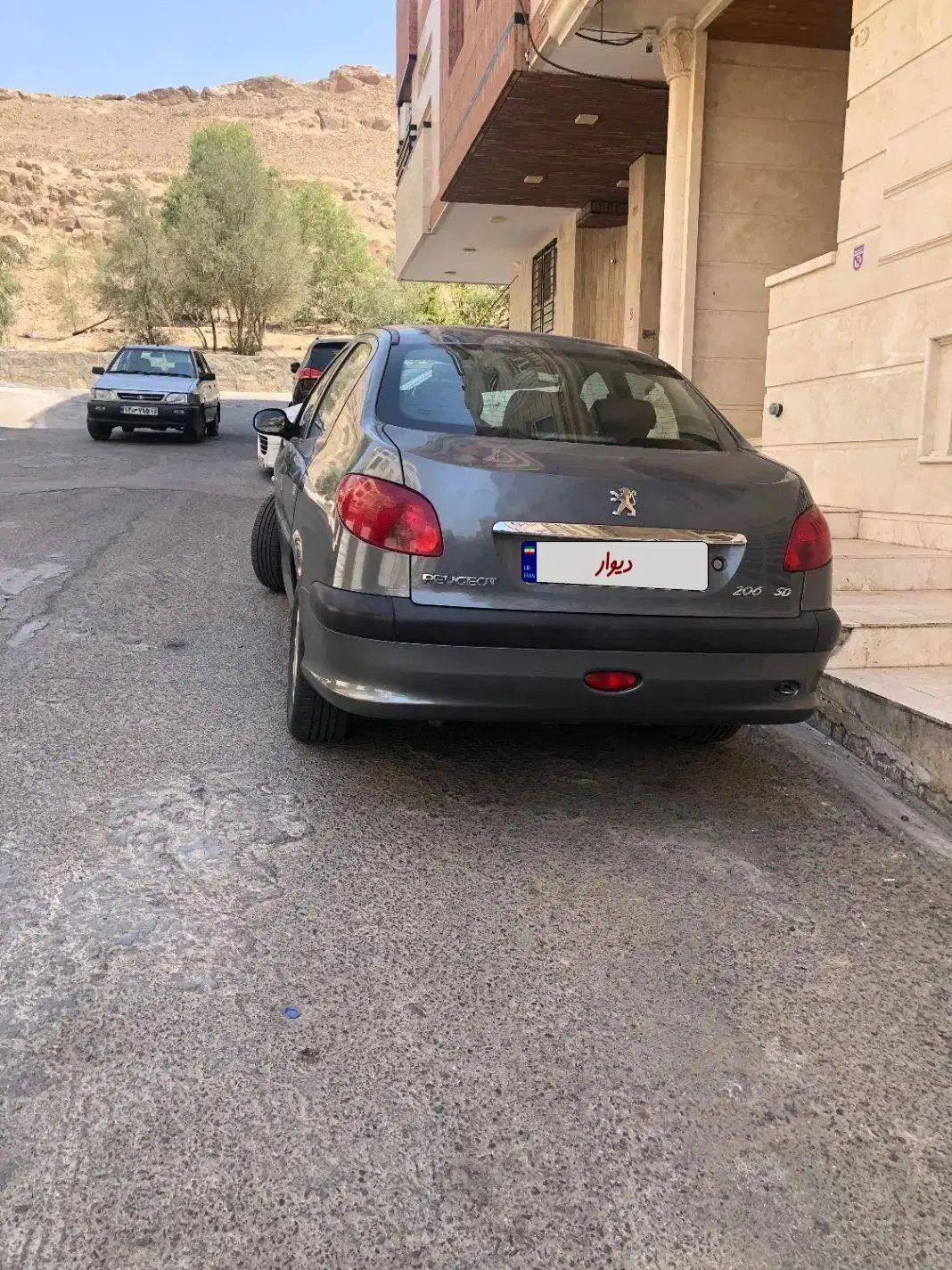 پژو ۲۰۶ صندوق دار v8 - 1399