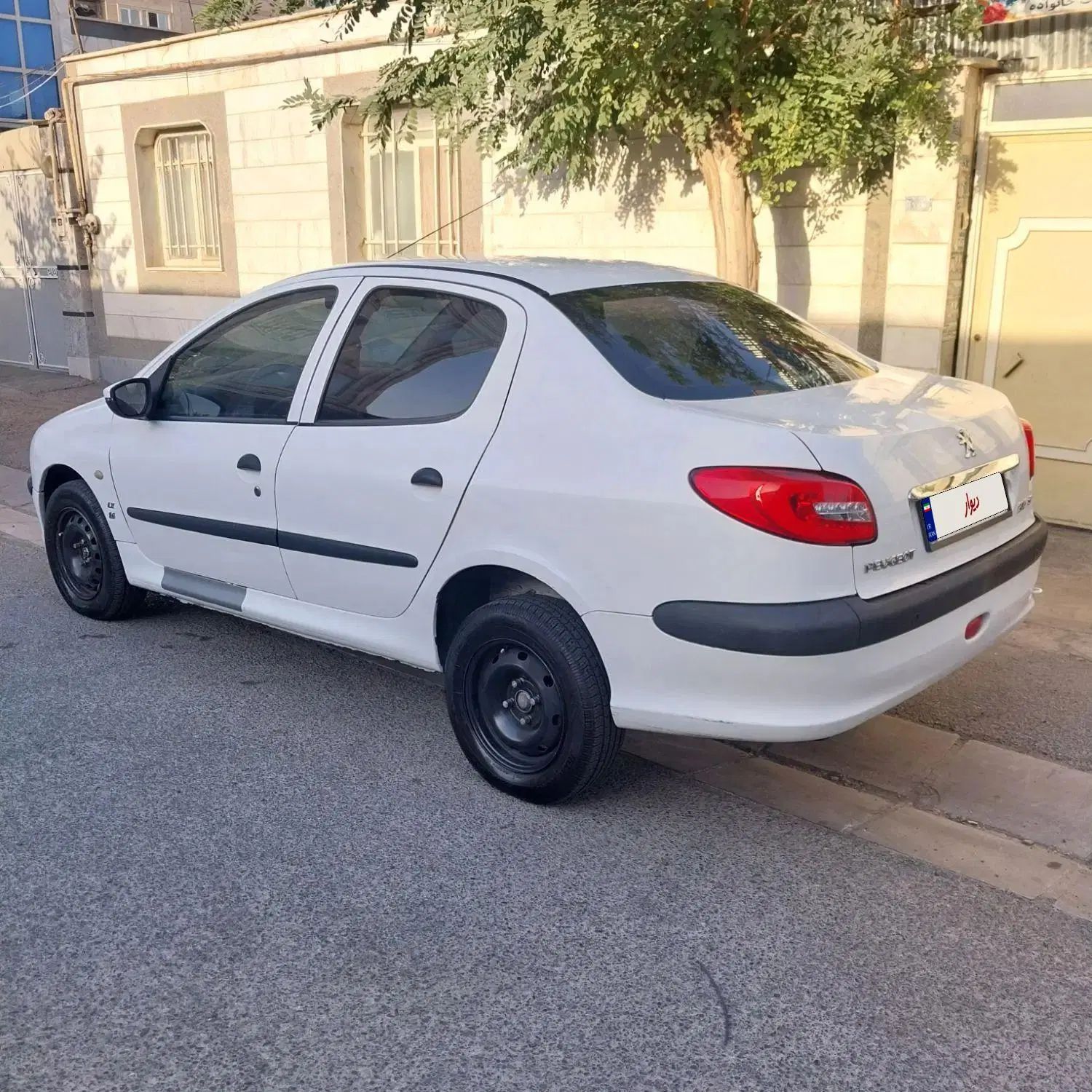 پژو ۲۰۶ صندوق دار v8 - 1396