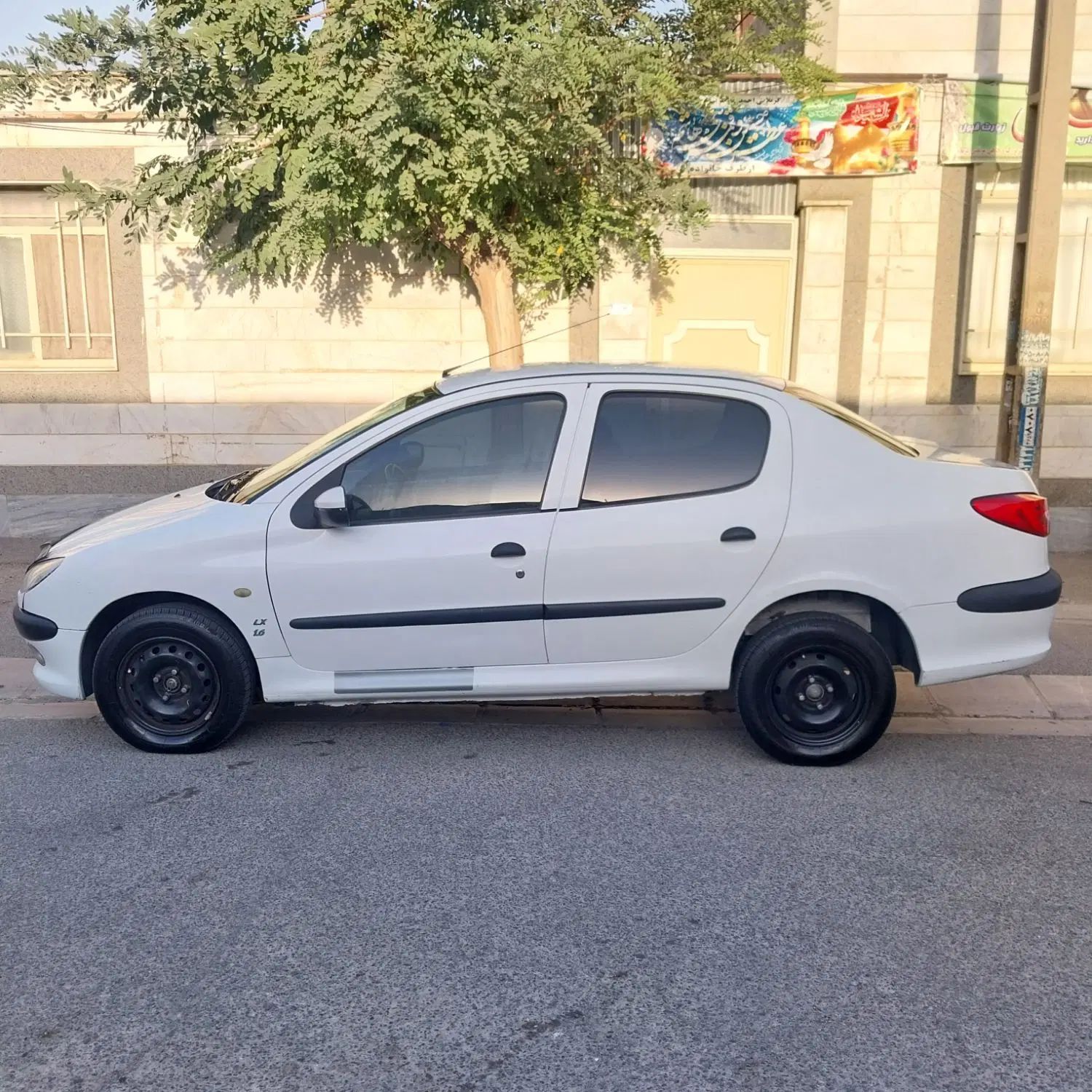 پژو ۲۰۶ صندوق دار v8 - 1396