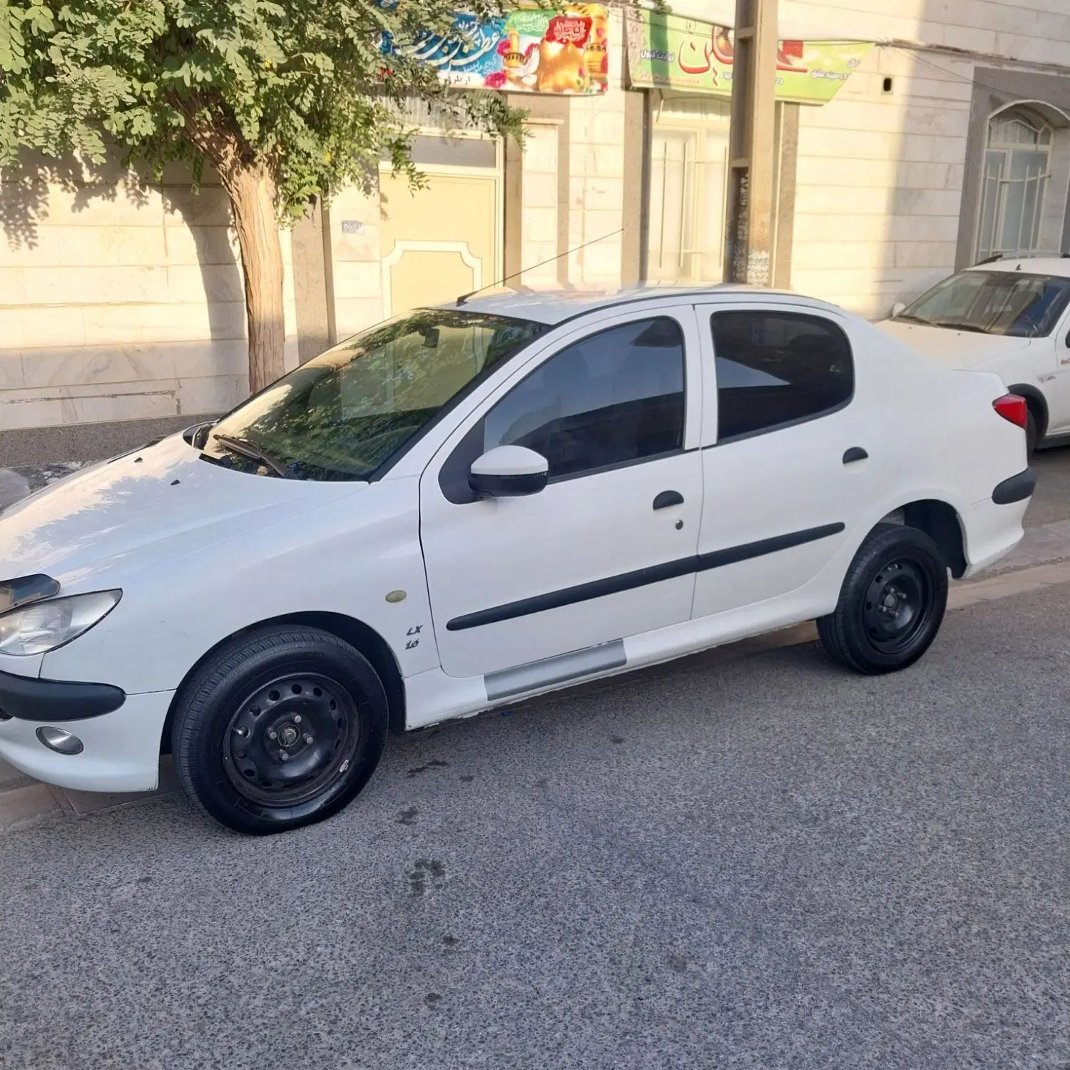 پژو ۲۰۶ صندوق دار v8 - 1396