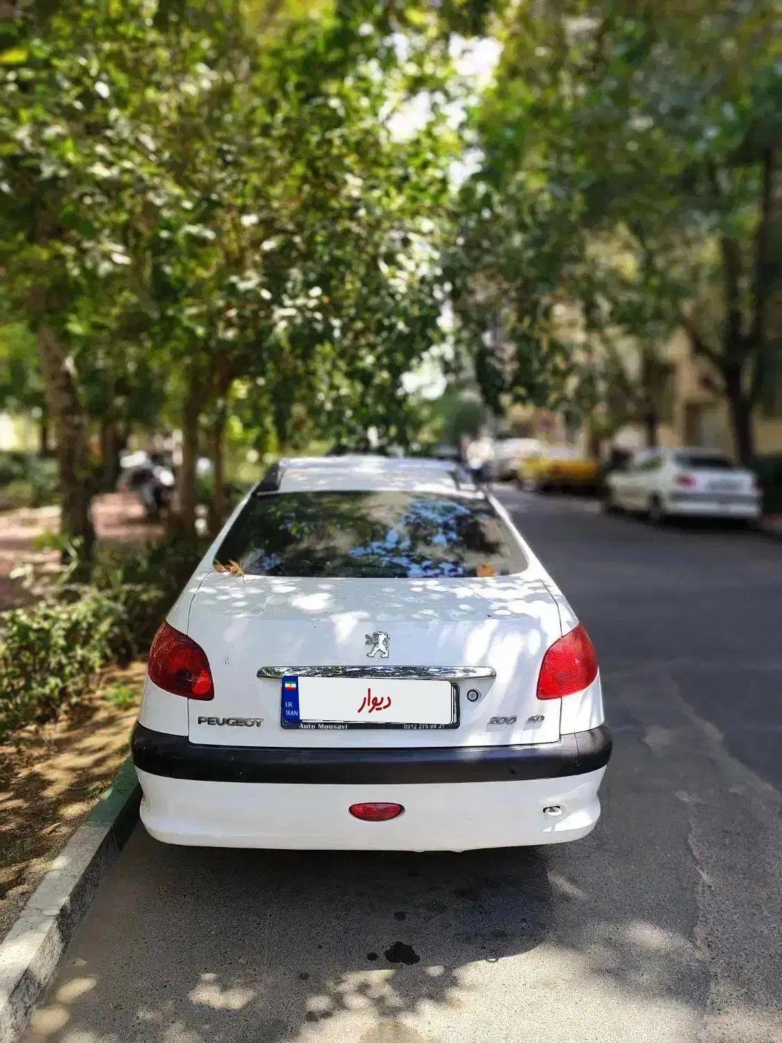 پژو ۲۰۶ صندوق دار v8 - 1397