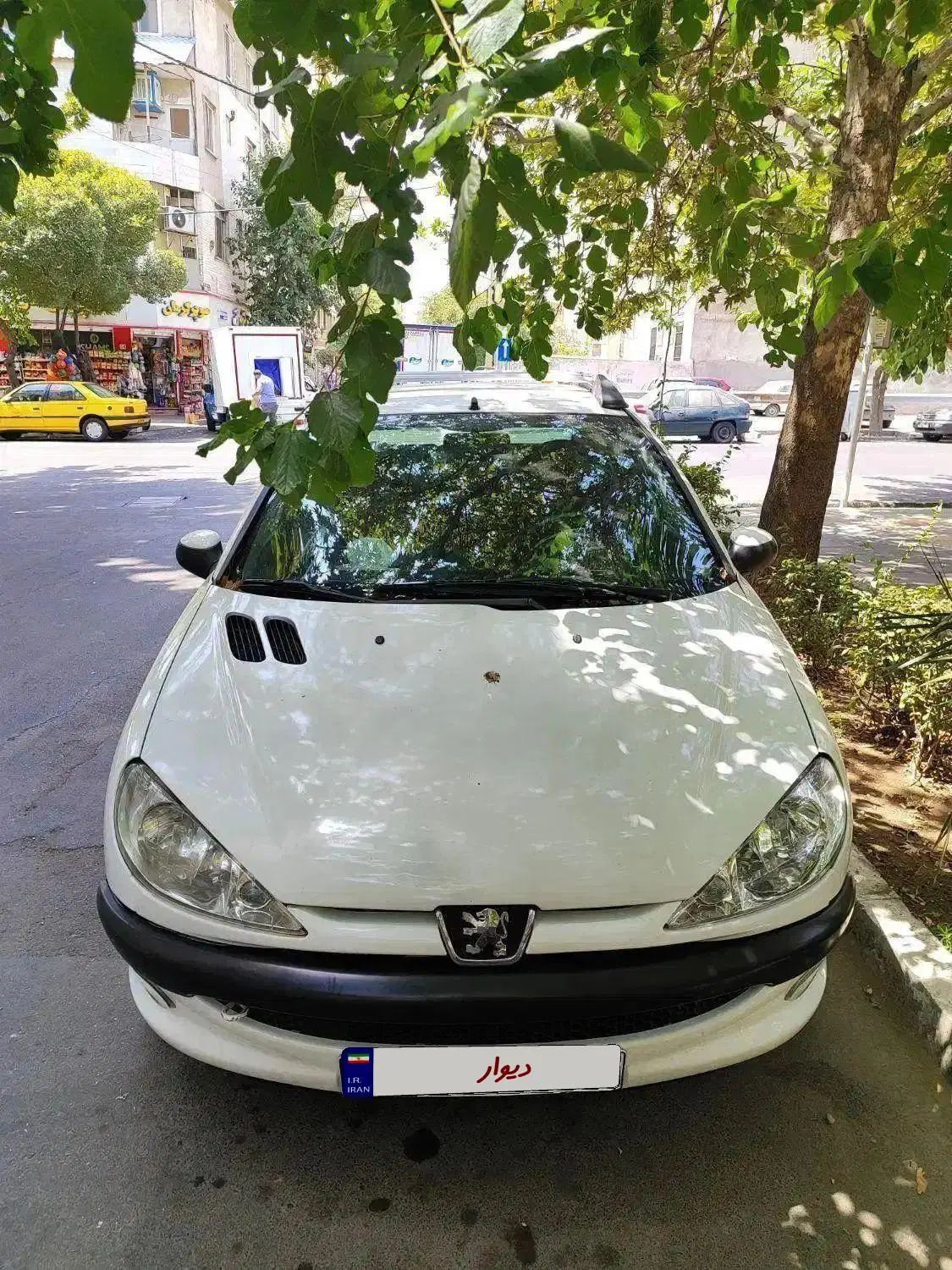 پژو ۲۰۶ صندوق دار v8 - 1397
