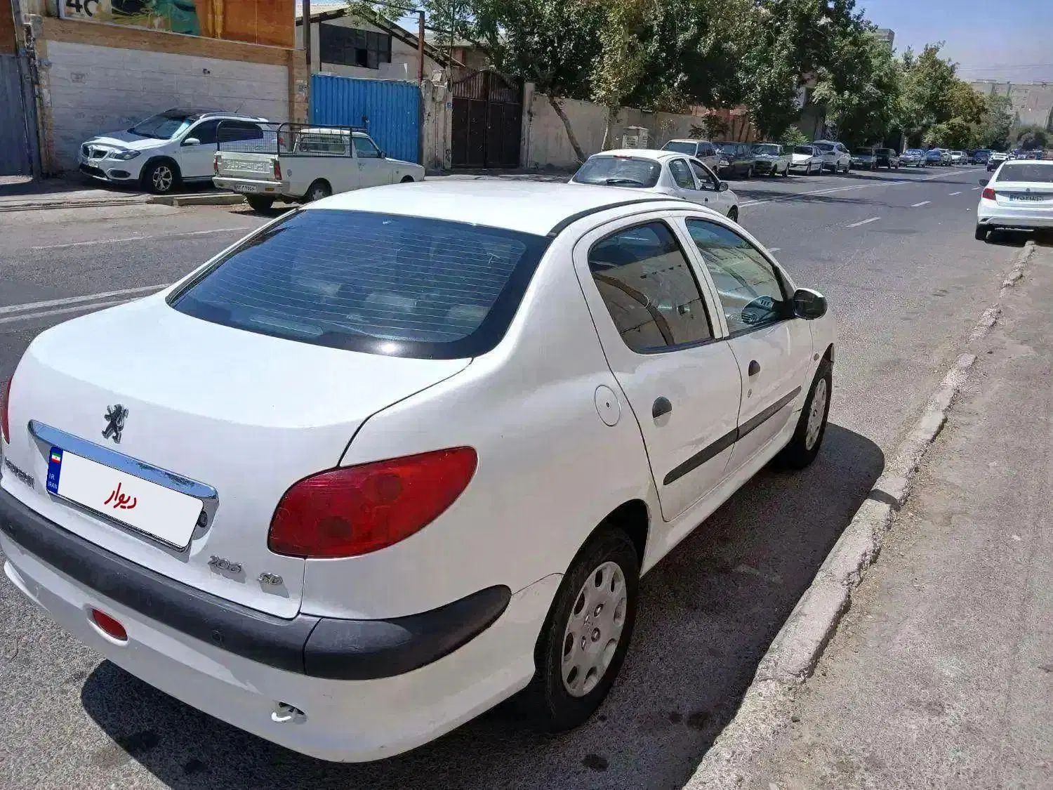 پژو ۲۰۶ صندوق دار v8 - 1395