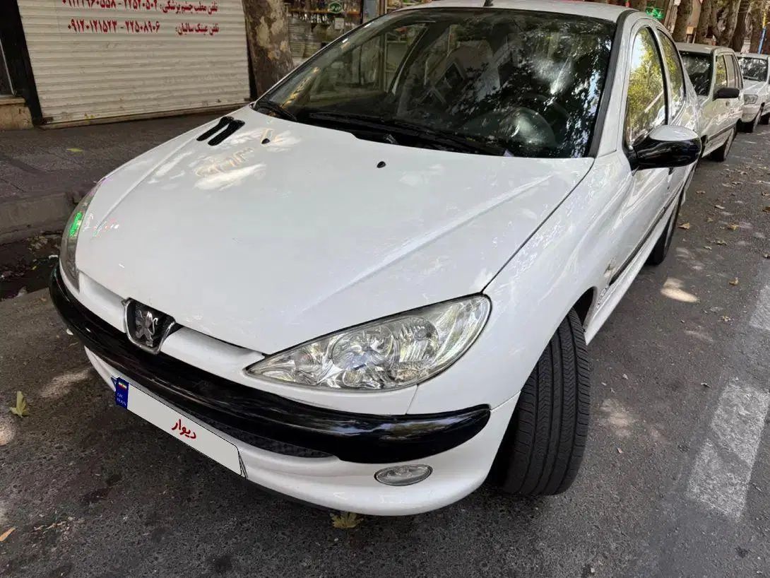 پژو ۲۰۶ صندوق دار v8 - 1396