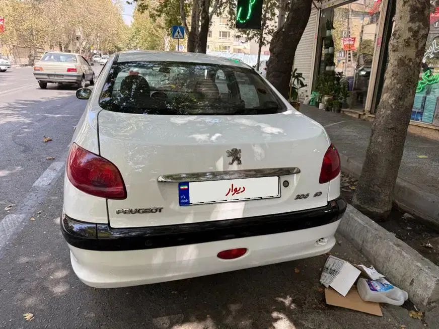 پژو ۲۰۶ صندوق دار v8 - 1396