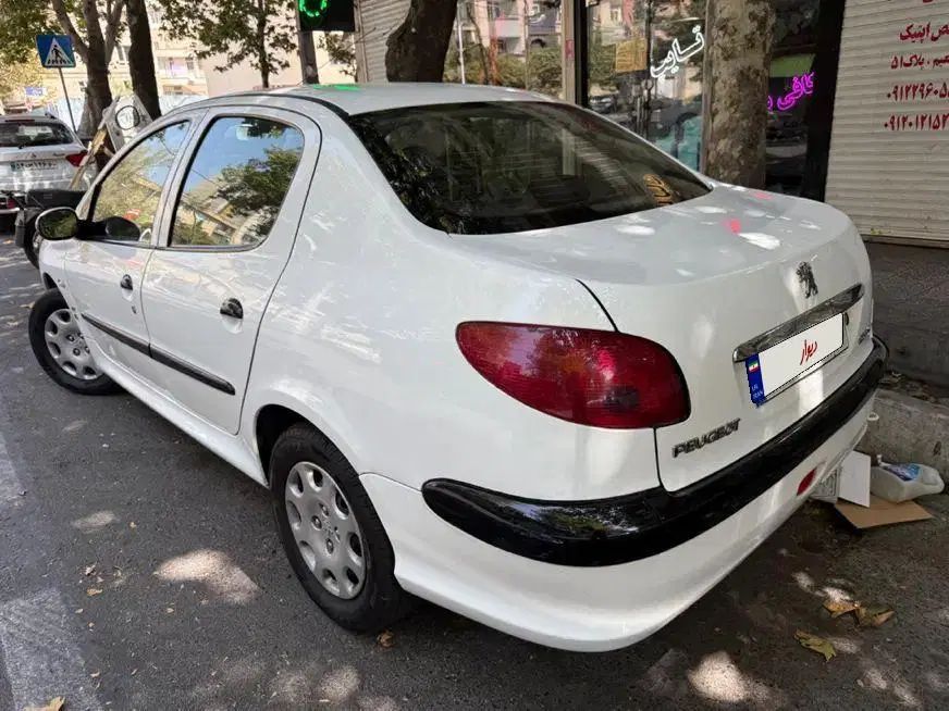 پژو ۲۰۶ صندوق دار v8 - 1396