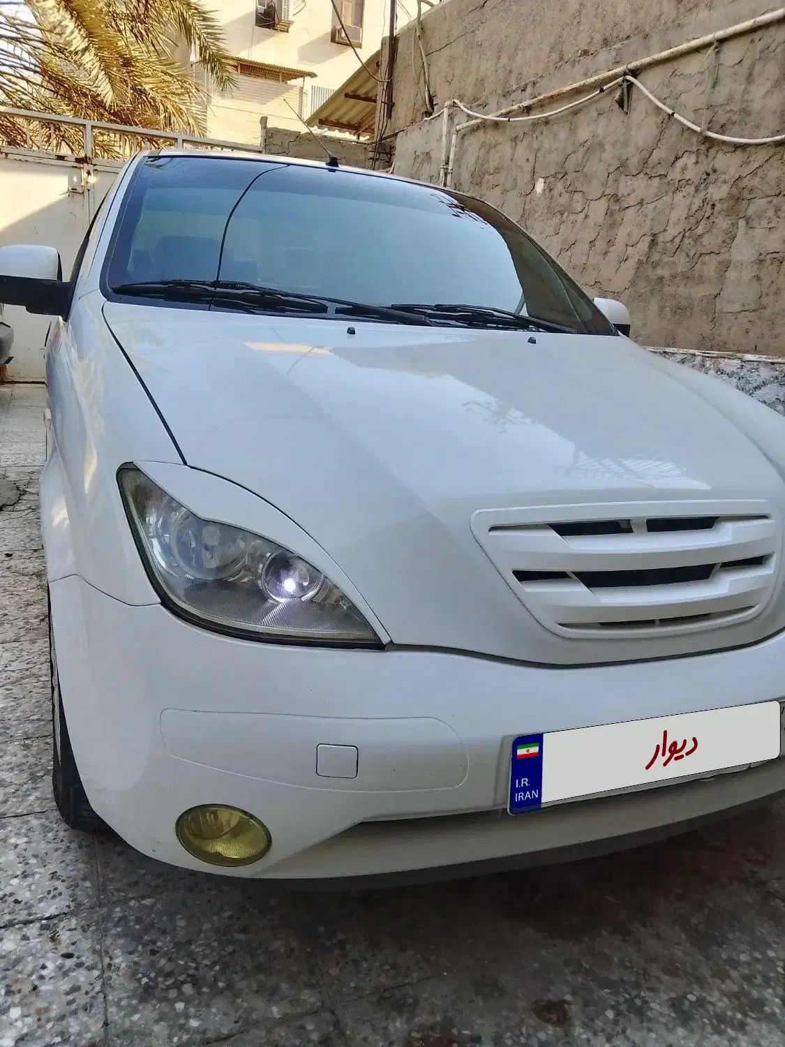 تیبا صندوق دار SX - 1401