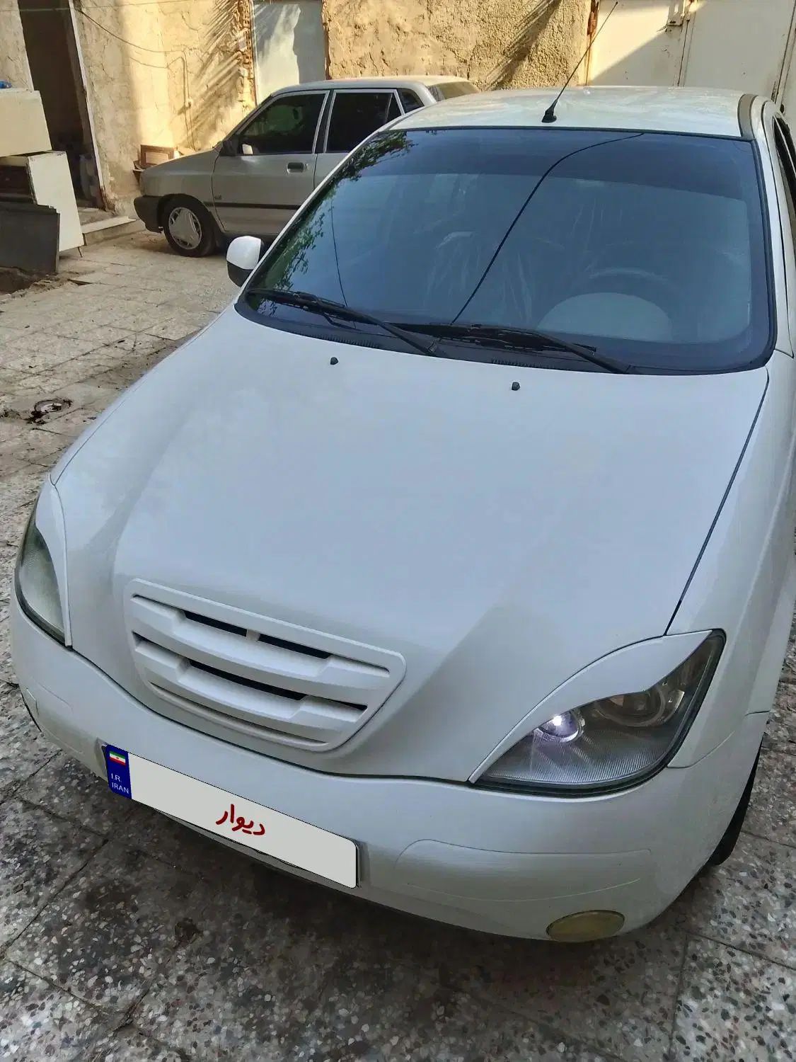 تیبا صندوق دار SX - 1401
