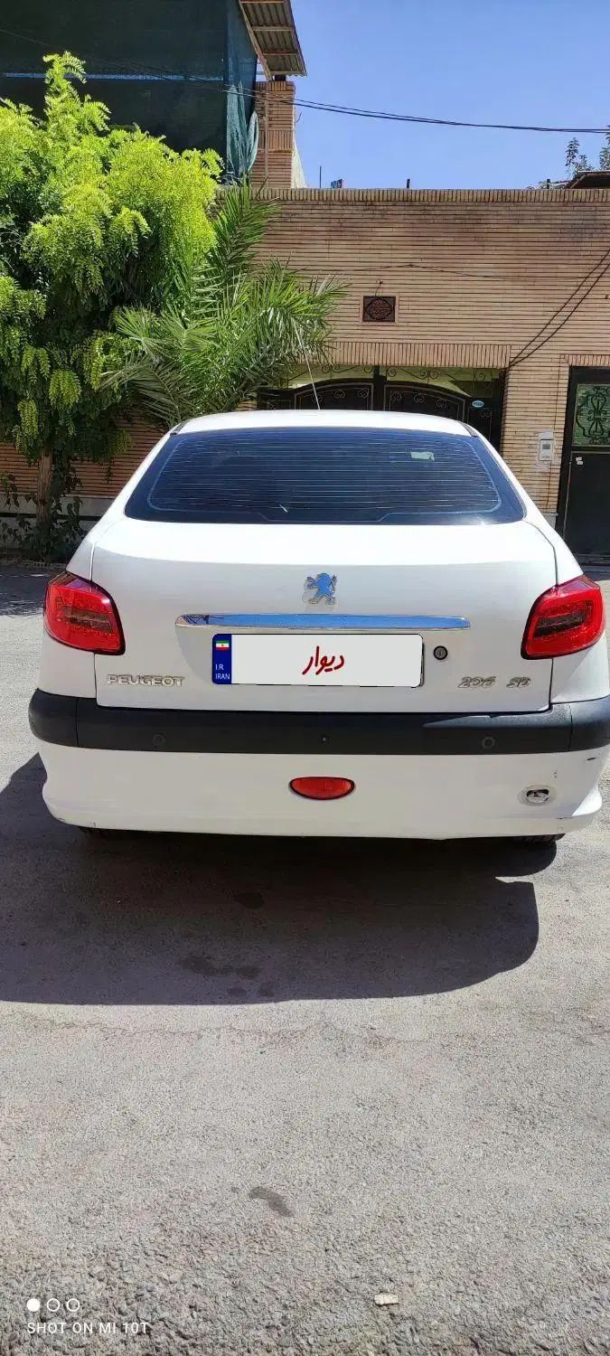 پژو ۲۰۶ صندوق دار v8 - 1396