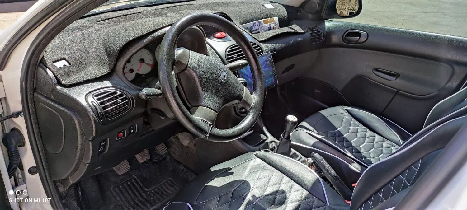 پژو ۲۰۶ صندوق دار v8 - 1396