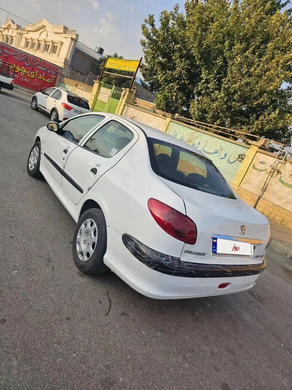 پژو ۲۰۶ صندوق دار v8 - 1390