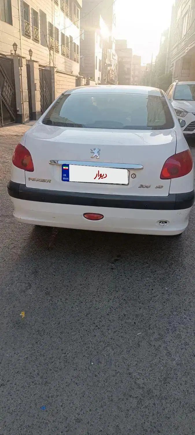پژو ۲۰۶ صندوق دار v8 - 1396