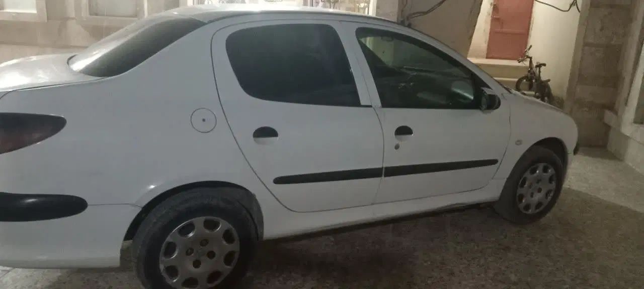 پژو ۲۰۶ صندوق دار v8 - 1391