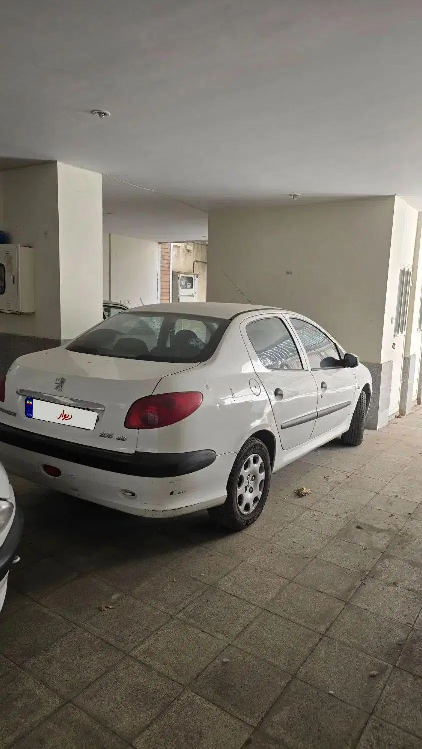 پژو ۲۰۶ صندوق دار v8 - 1396