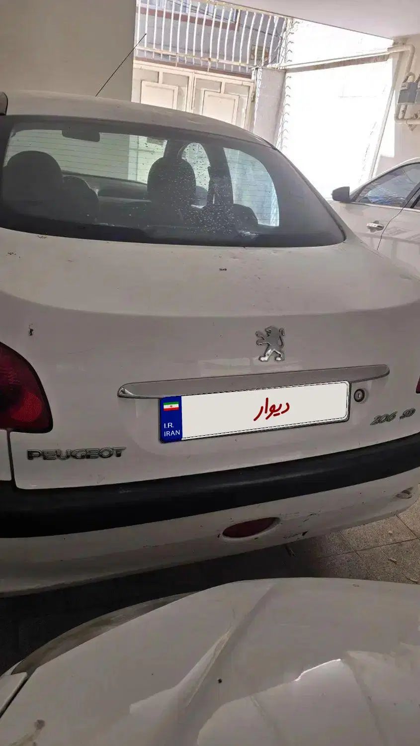 پژو ۲۰۶ صندوق دار v8 - 1396