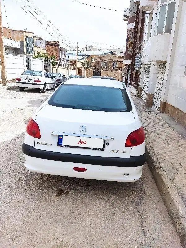 پژو ۲۰۶ صندوق دار v8 - 1395