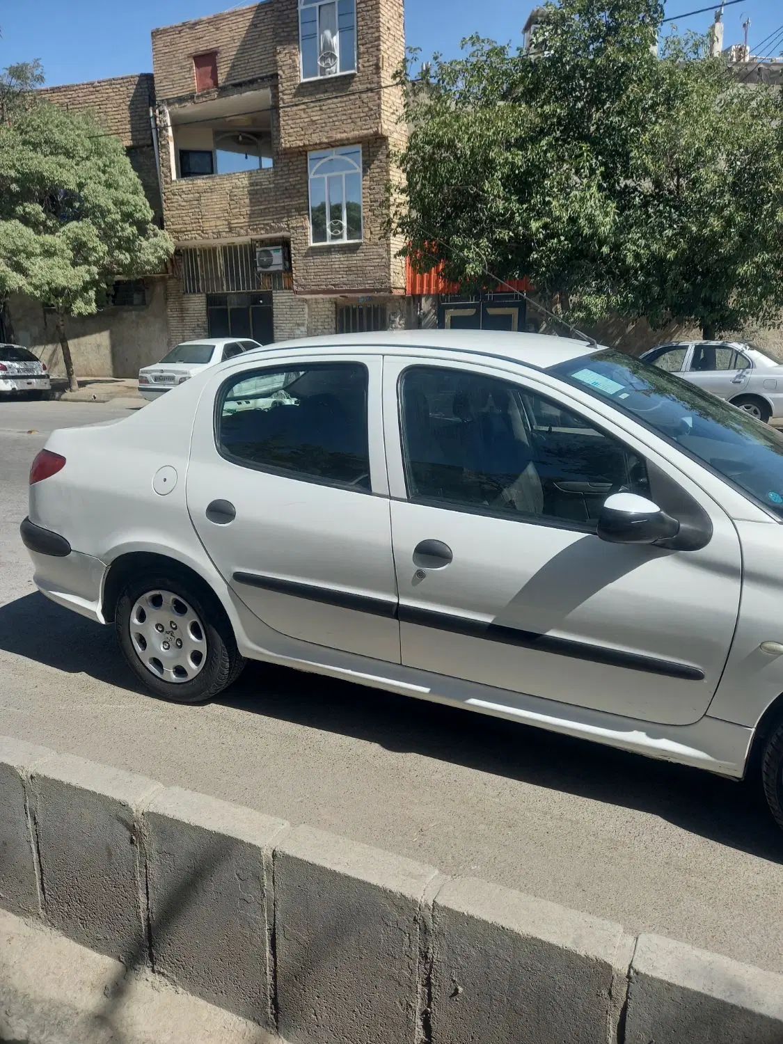 پژو ۲۰۶ صندوق دار v8 - 1396
