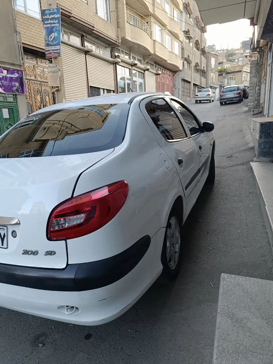 پژو ۲۰۶ صندوق دار v8 - 1398
