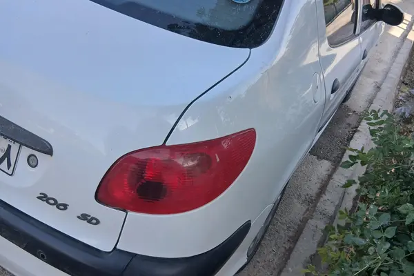 پژو ۲۰۶ صندوق دار v8 - 1396