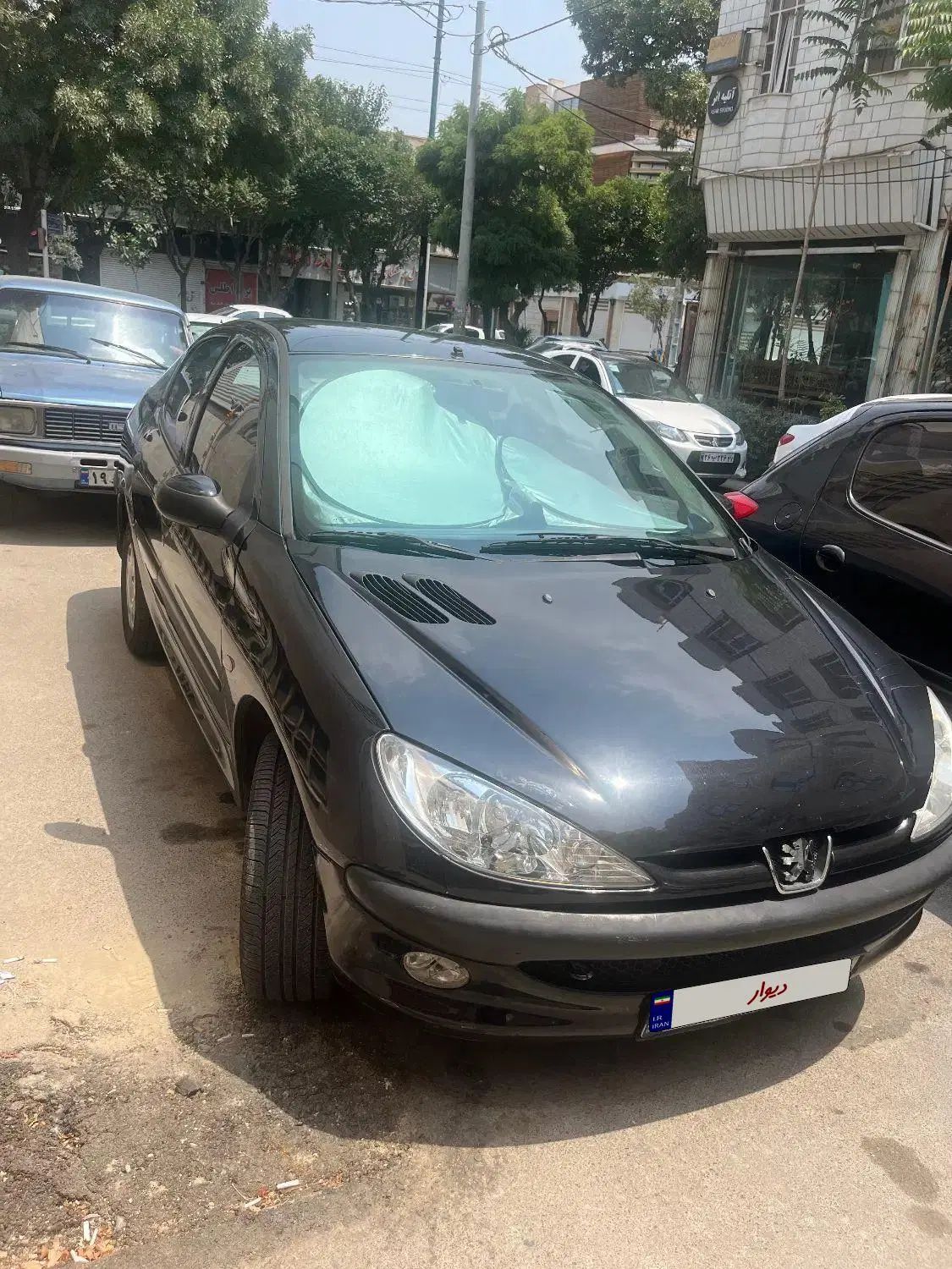 پژو ۲۰۶ صندوق دار v8 - 1395