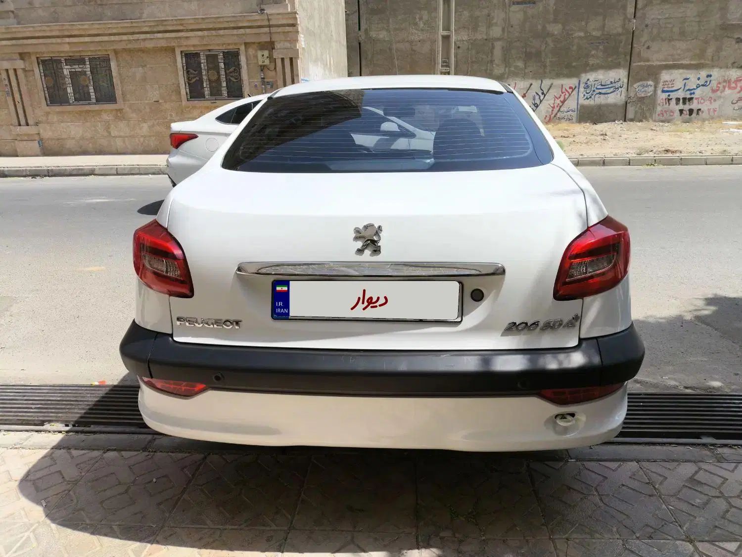 پژو ۲۰۶ صندوق دار v8 - 1394